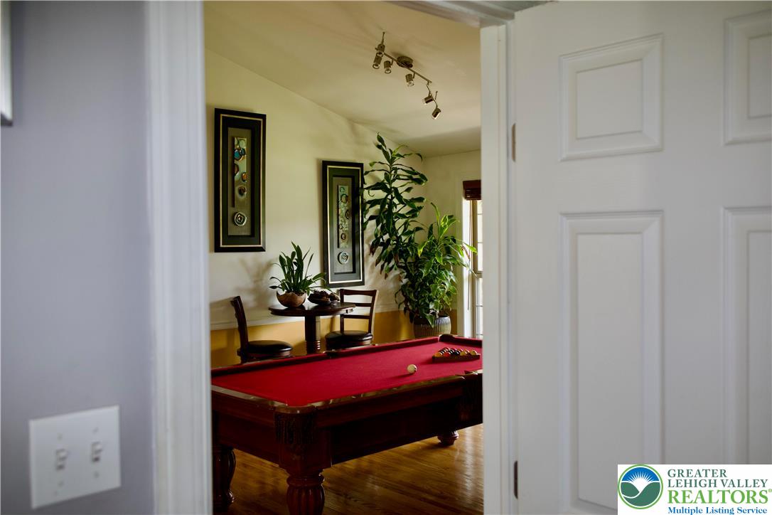 101 Cider Mill Road Mertztown, PA 19539 - Photo 18 of 26 a view of a room with furniture and a potted plant