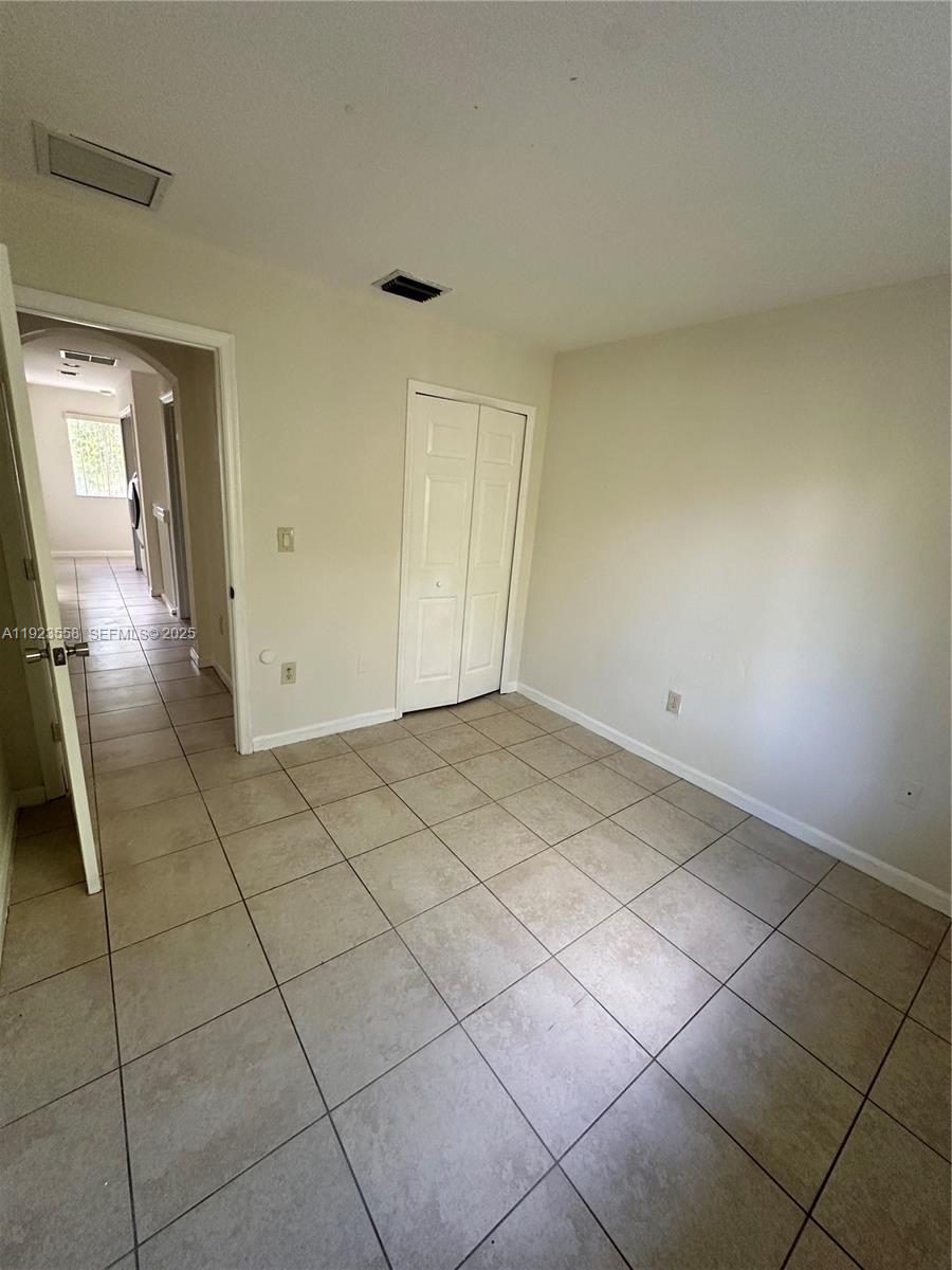 1529 Southeast 24th Court, Unit 233 Homestead, FL 33035 - Photo 17 of 35 a view of a livingroom and entryway