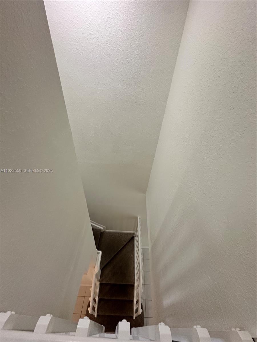 1529 Southeast 24th Court, Unit 233 Homestead, FL 33035 - Photo 24 of 35 a view of entryway with wooden floor