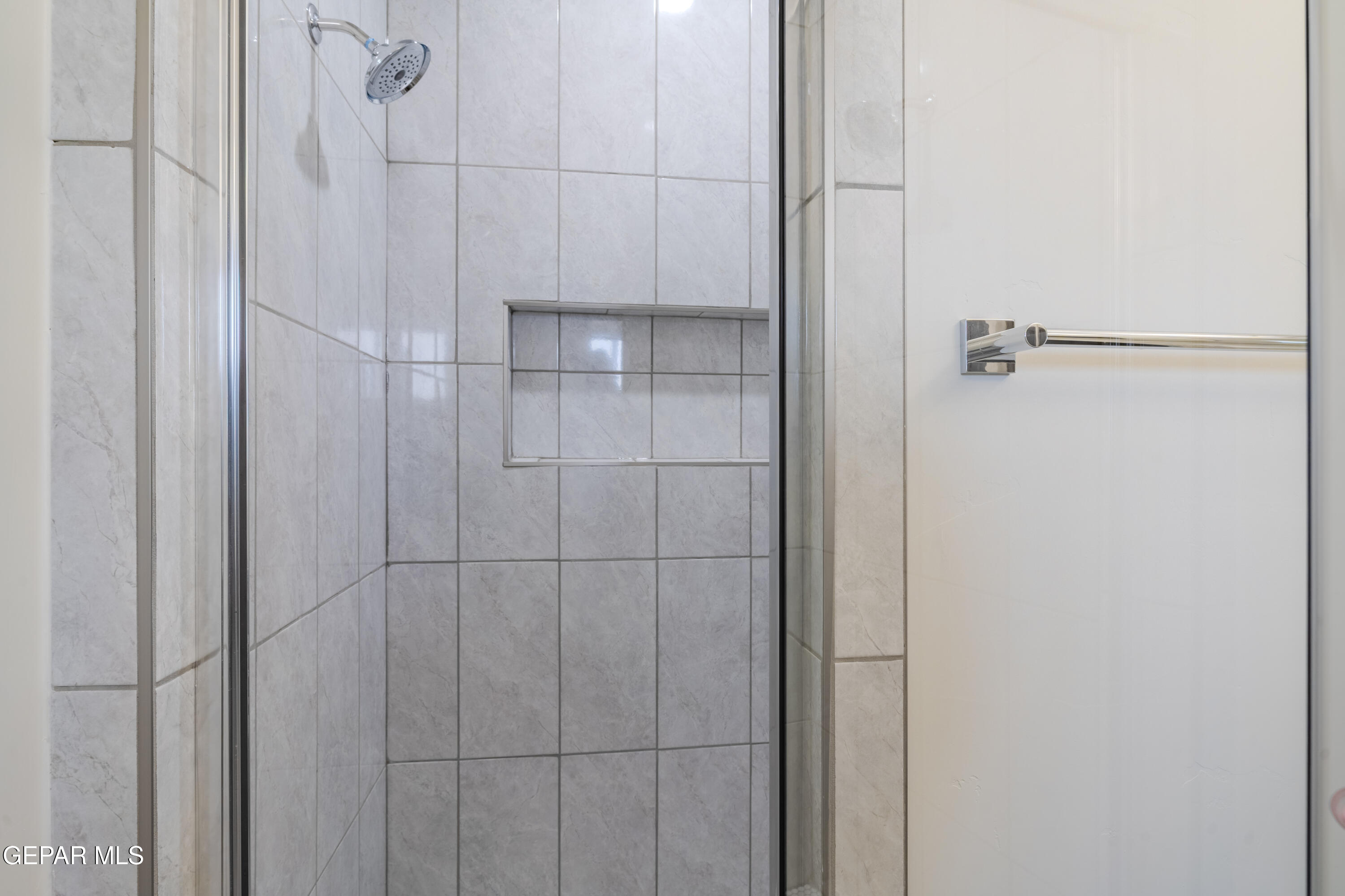 985 Barbara Avenue Socorro, TX 79927 - Photo 15 of 29 a bathroom with a shower