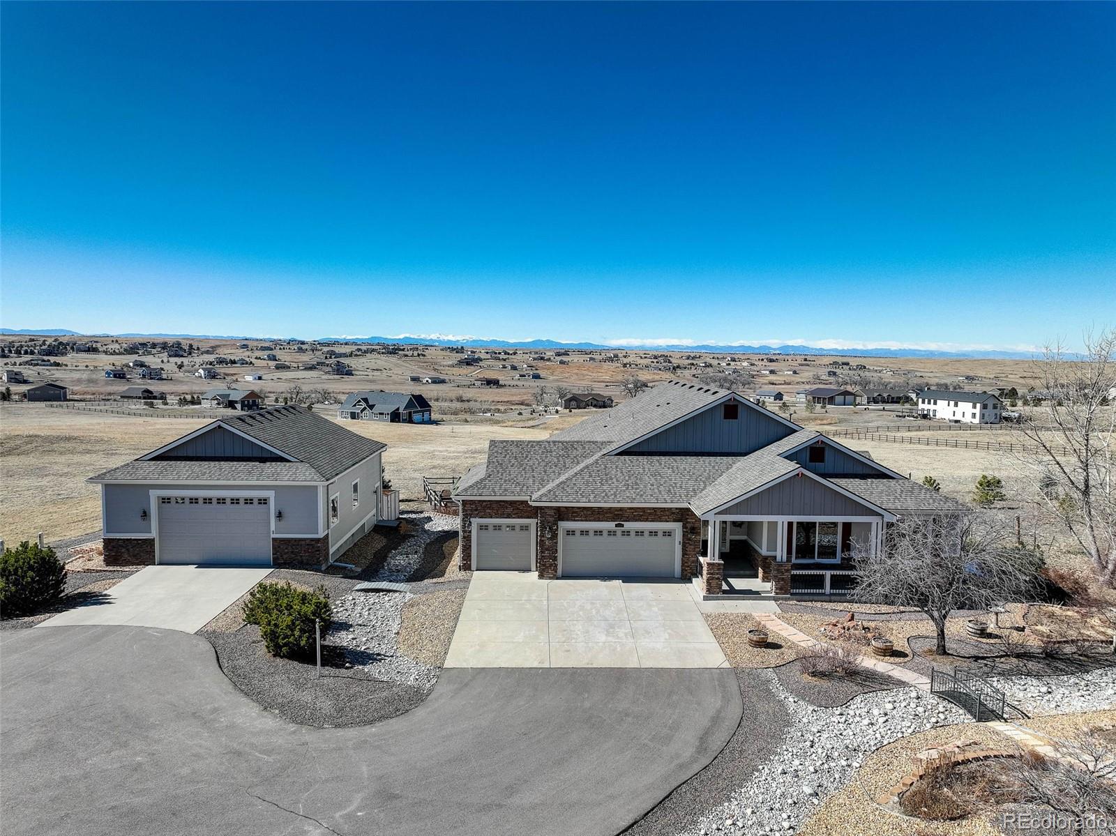 3441 Antelope Ridge Trail Parker, CO 80138 - Photo 1 of 50 a view of a big house with a big yard