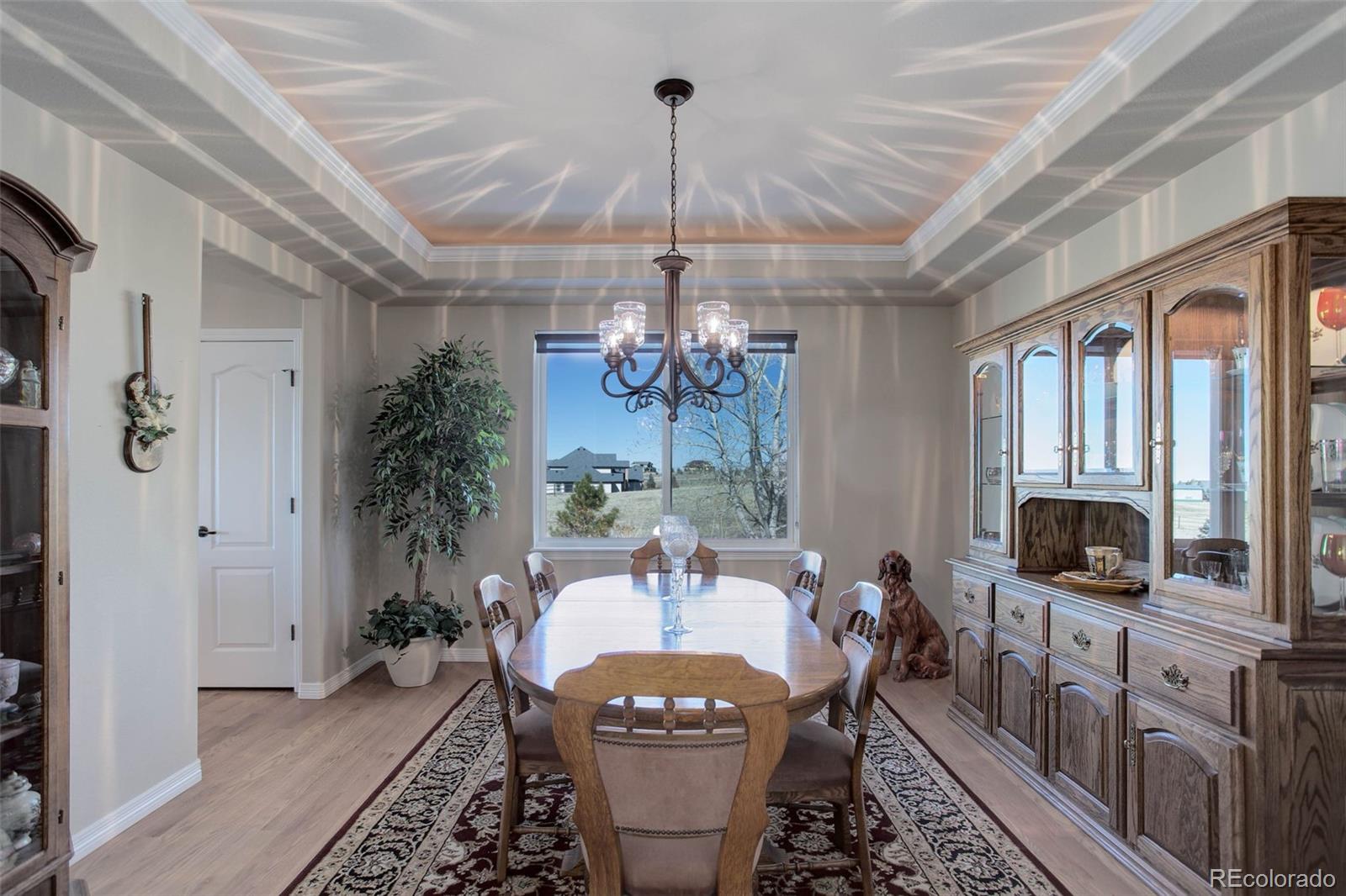 3441 Antelope Ridge Trail Parker, CO 80138 - Photo 19 of 50 a very nice looking dining room with a table and chairs