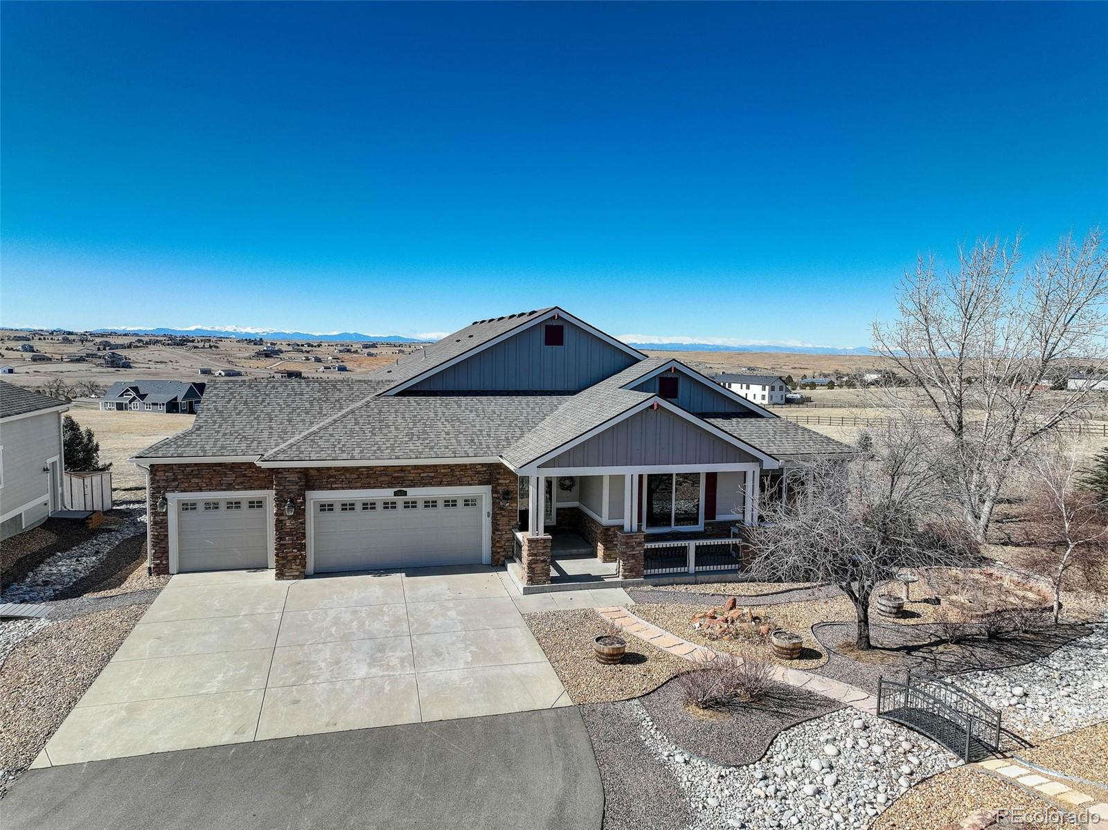 3441 Antelope Ridge Trail Parker, CO 80138 - Photo 2 of 50 a front view of a house with a yard