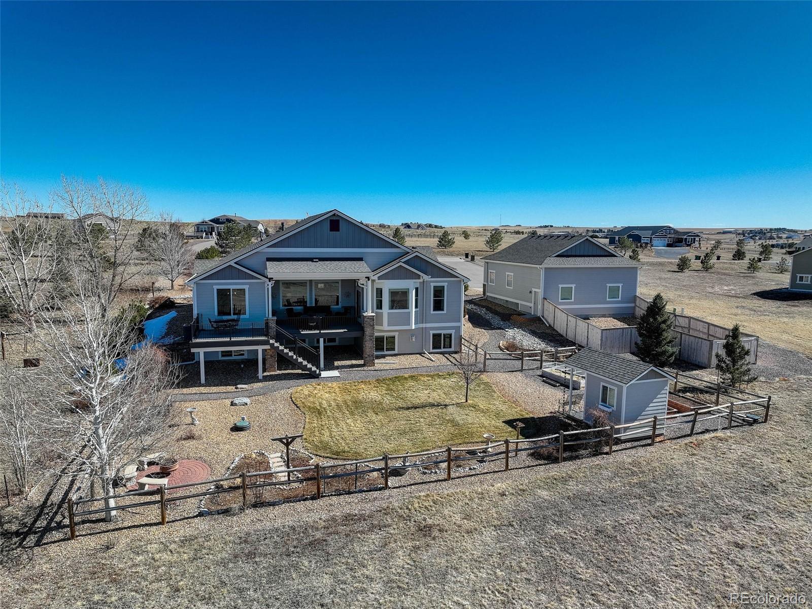 3441 Antelope Ridge Trail Parker, CO 80138 - Photo 44 of 50 an aerial view of a house with swimming pool