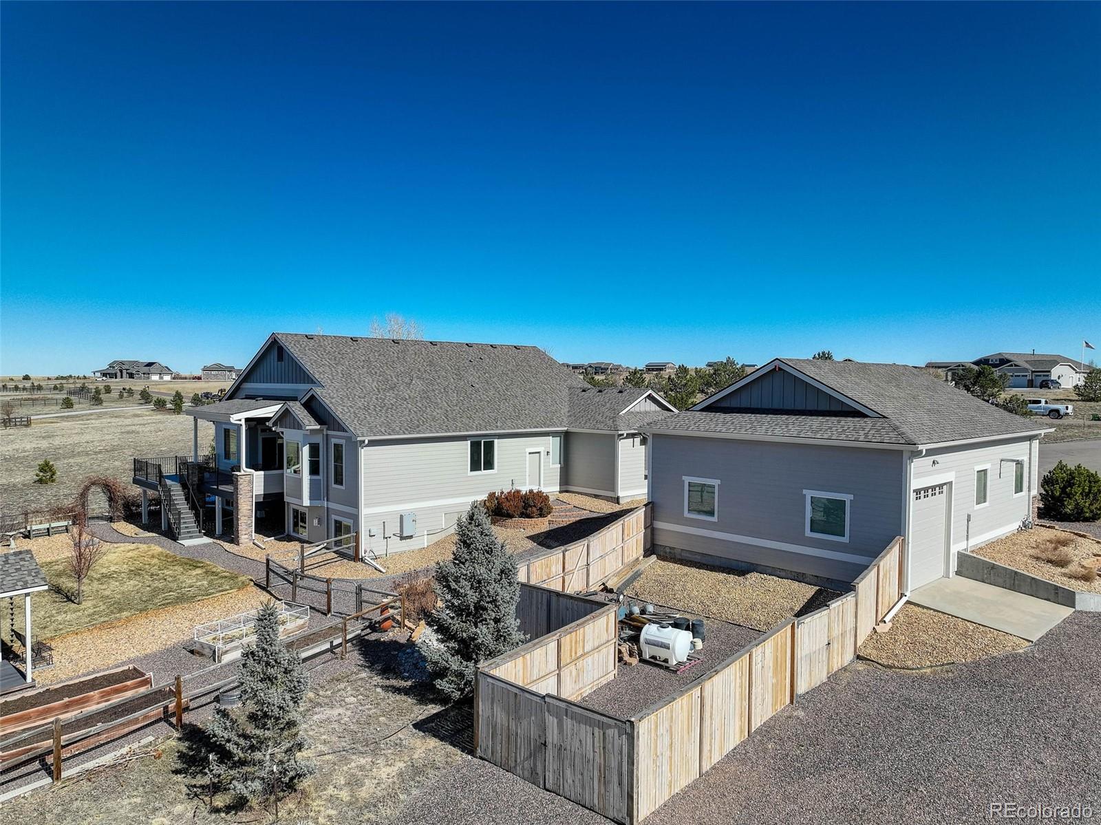 3441 Antelope Ridge Trail Parker, CO 80138 - Photo 48 of 50 front view of a house with a patio