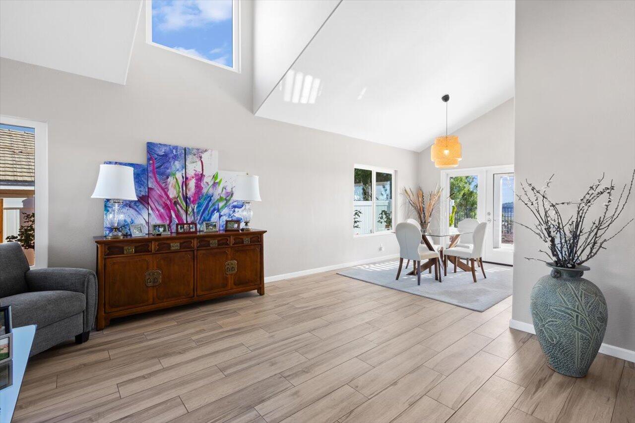 911 Rivertree Drive Oceanside, CA 92058 - Photo 21 of 43 a living room with furniture and wooden floor