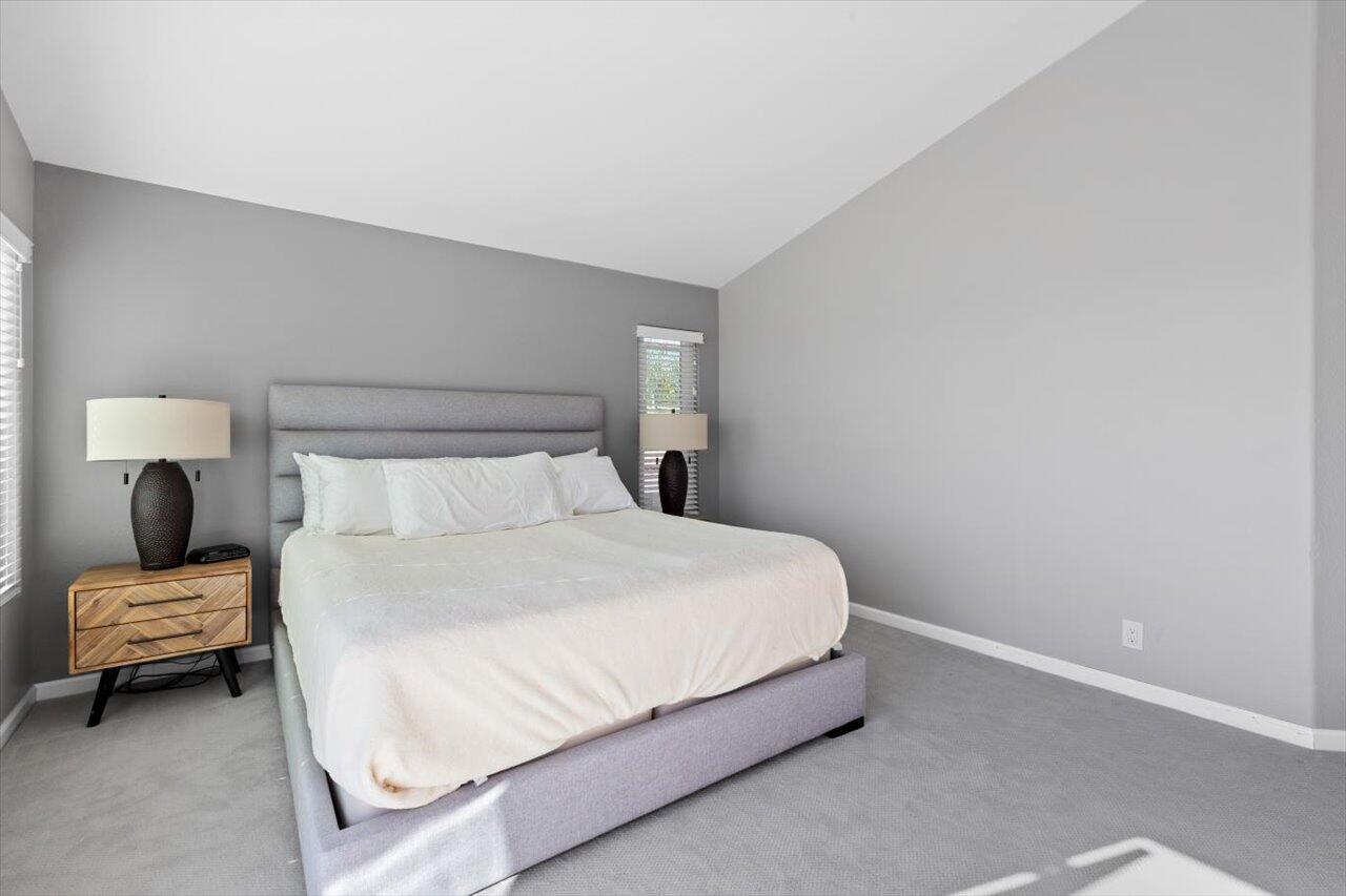 911 Rivertree Drive Oceanside, CA 92058 - Photo 24 of 43 a bedroom with a bed and chair