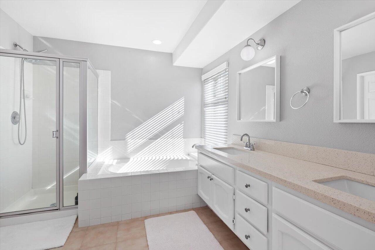 911 Rivertree Drive Oceanside, CA 92058 - Photo 25 of 43 a bathroom with a granite countertop sink mirror and a toilet