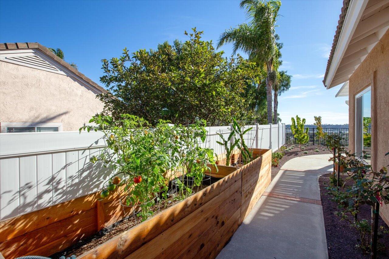 911 Rivertree Drive Oceanside, CA 92058 - Photo 33 of 43 a view of a balcony with flower plants