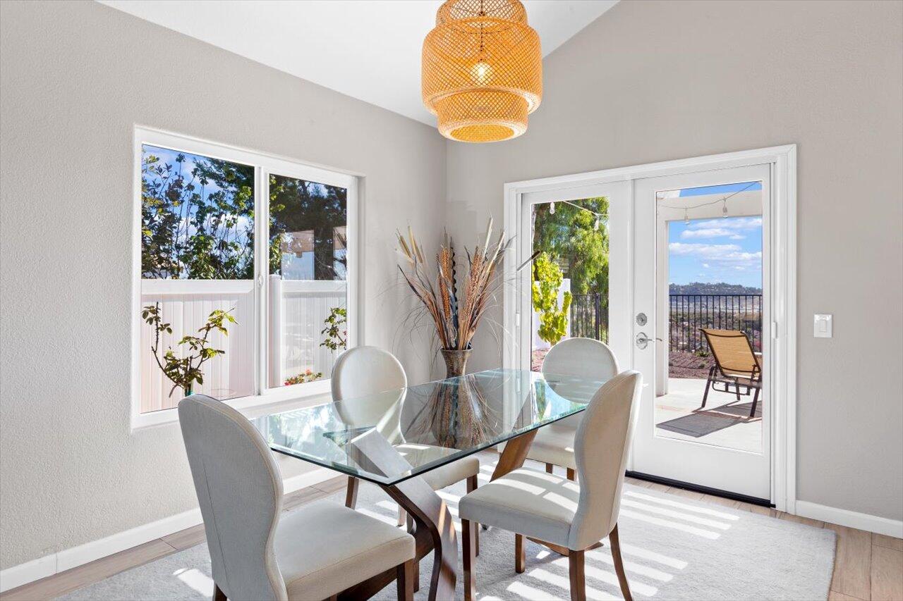 911 Rivertree Drive Oceanside, CA 92058 - Photo 6 of 43 a dining room with furniture and window