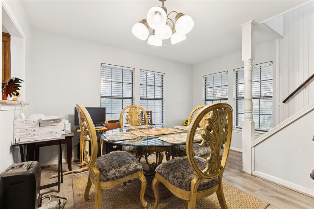 202 Blue Mound Road East Haslet, TX 76052 - Photo 12 of 31 a view of a dining room with furniture window and wooden floor
