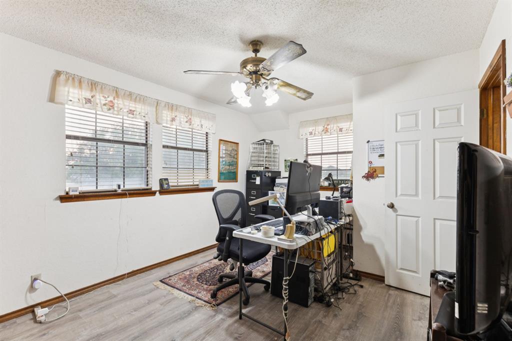 202 Blue Mound Road East Haslet, TX 76052 - Photo 21 of 31 a workspace with chandelier