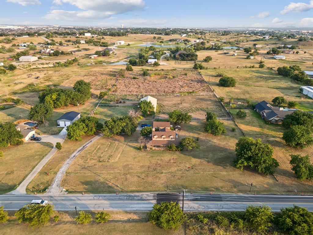 202 Blue Mound Road East Haslet, TX 76052 - Photo 28 of 31 an aerial view of residential houses with outdoor space