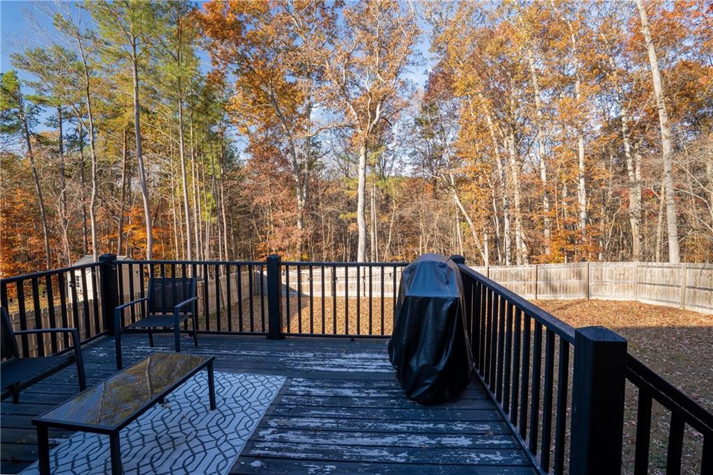 2708 Quarles Road Rocky Face, GA 30740 - Photo 30 of 40 a view of a balcony with wooden floor and outdoor space