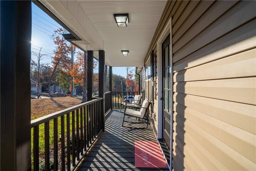 2708 Quarles Road Rocky Face, GA 30740 - Photo 5 of 40 a view of a balcony with furniture