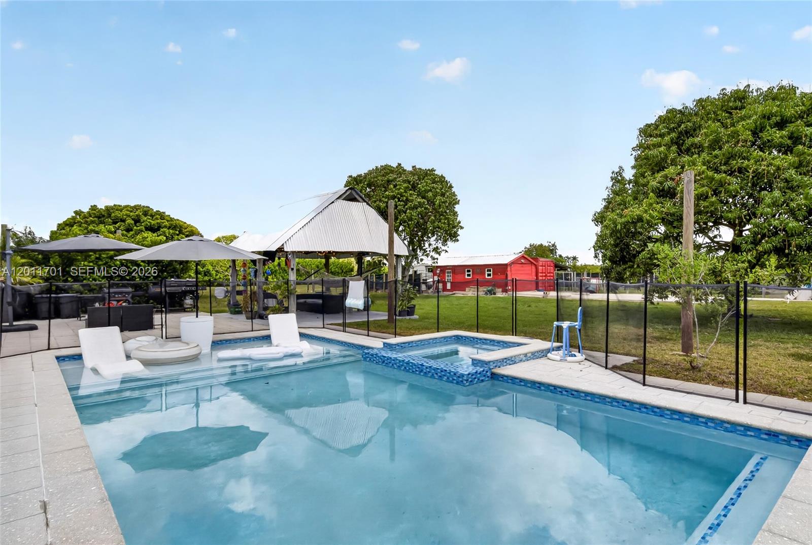21175 Southwest 232nd Street Miami, FL 33170 - Photo 39 of 66 a view of outdoor space with seating area