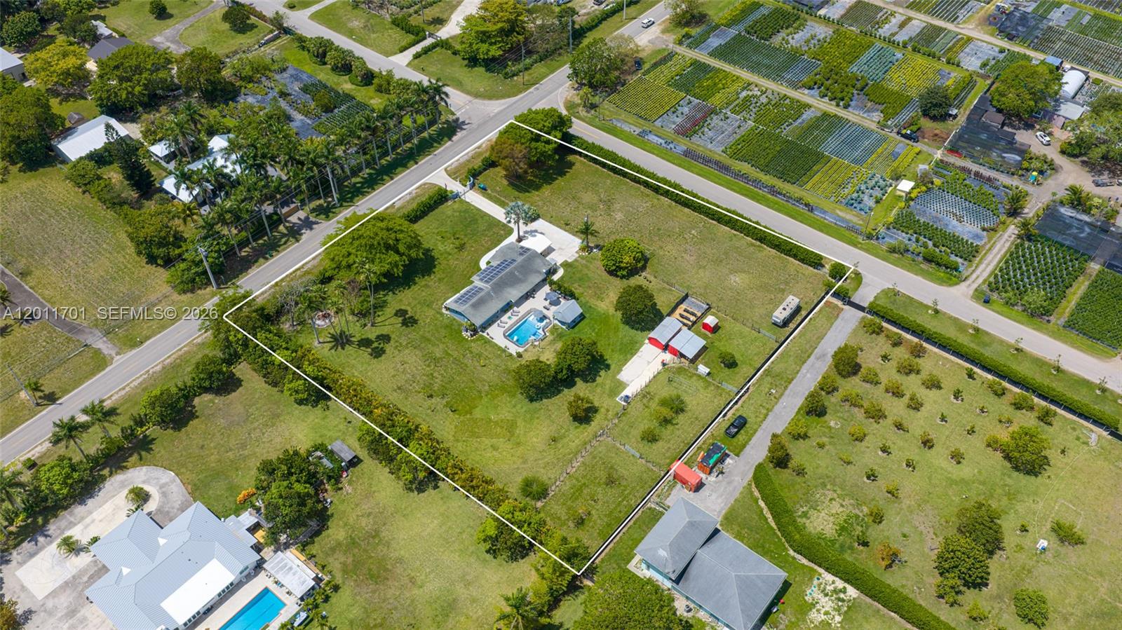 21175 Southwest 232nd Street Miami, FL 33170 - Photo 58 of 66 an aerial view of a residential houses with outdoor space