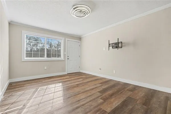 an empty room with windows