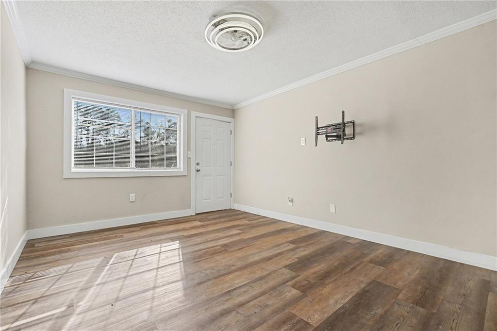 405 Fairburn Road Southwest, Unit 231 Atlanta, GA 30331 - Photo 3 of 16 an empty room with windows
