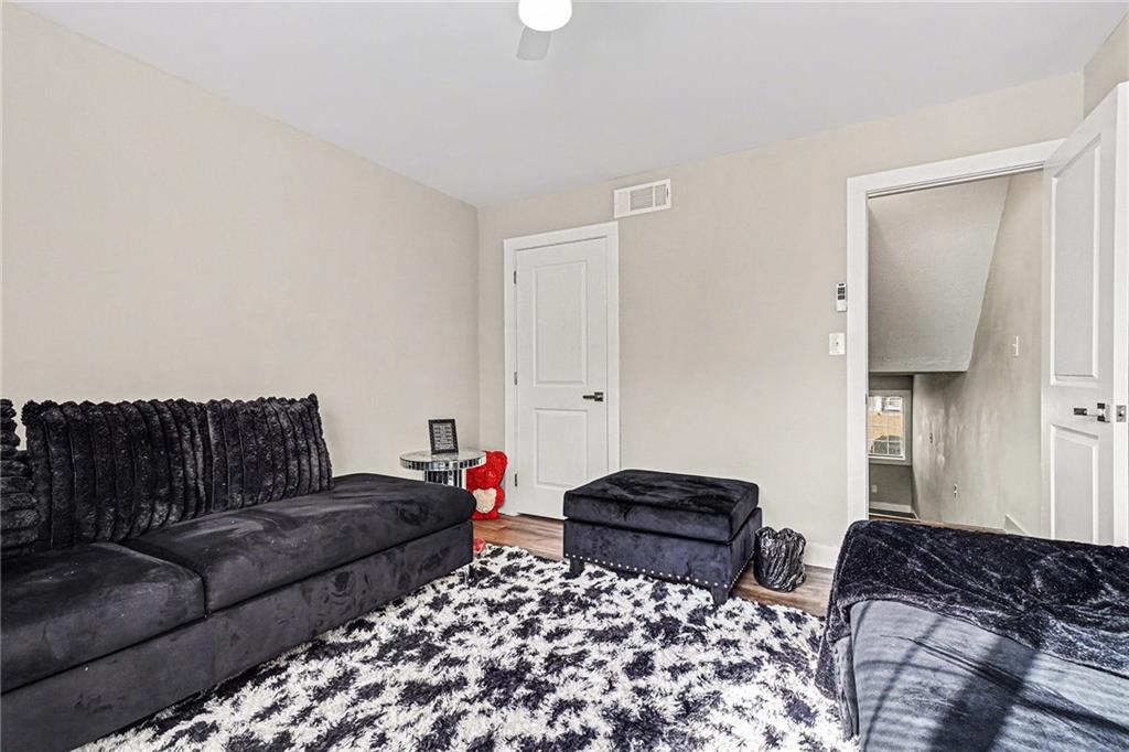 405 Fairburn Road Southwest, Unit 231 Atlanta, GA 30331 - Photo 5 of 16 a living room with furniture