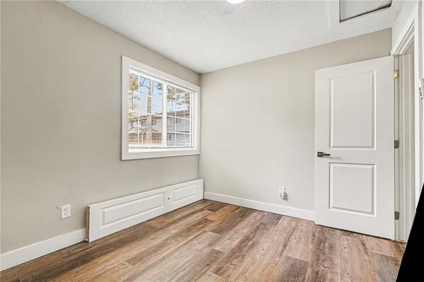 a view of a room that has a window in it