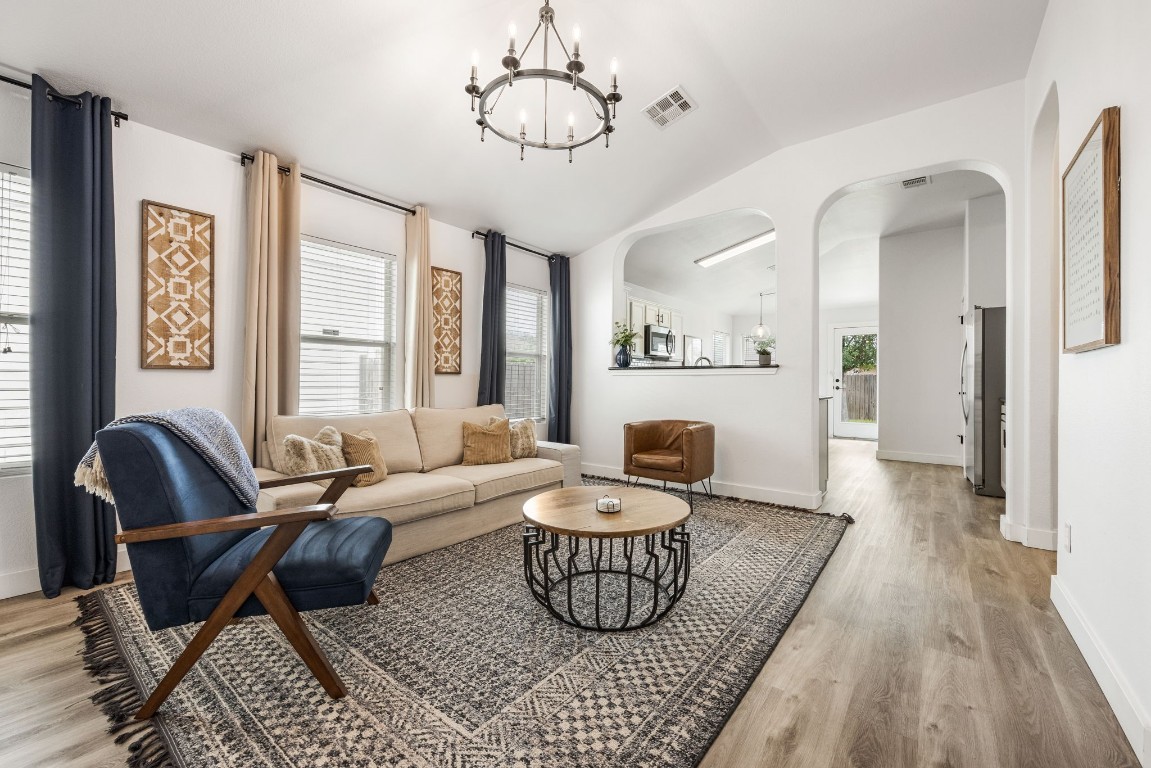 a living room with furniture or couch and a window