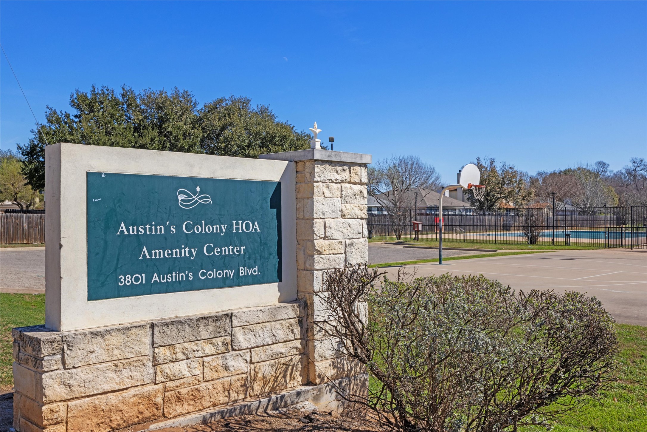 3309 Wickham Lane Austin, TX 78725 - Photo 21 of 24 a sign that is on the side of a building
