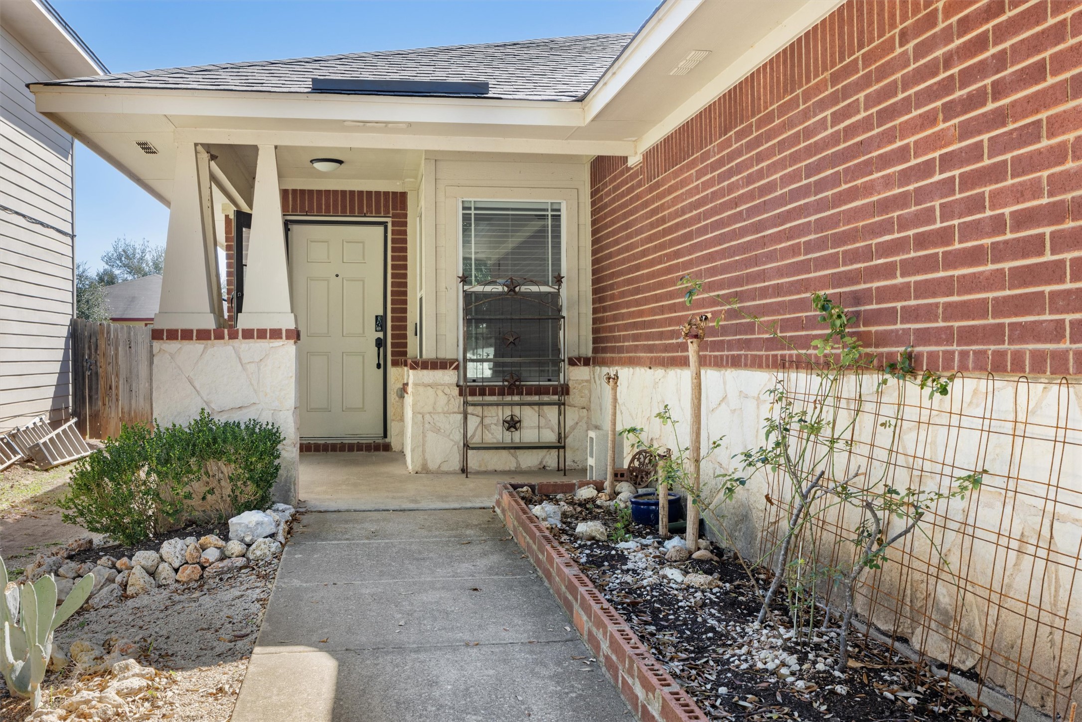 3309 Wickham Lane Austin, TX 78725 - Photo 3 of 24 a view of a pathway of a house