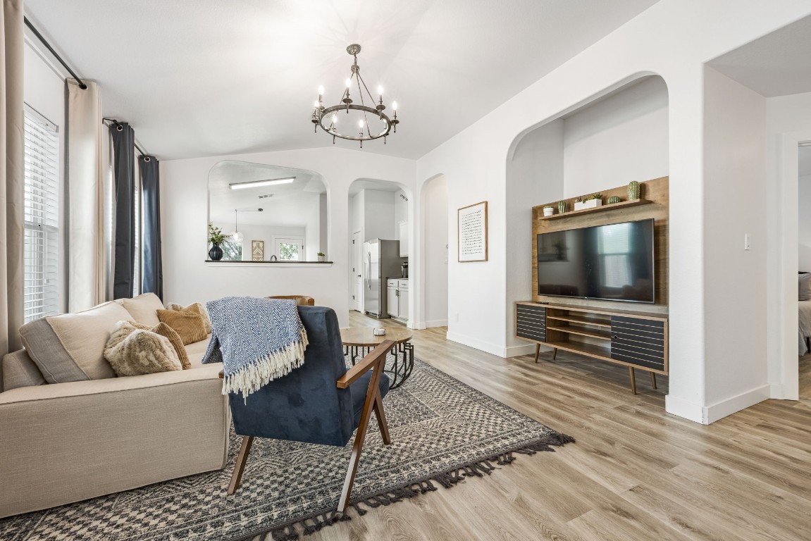 3309 Wickham Lane Austin, TX 78725 - Photo 4 of 24 a living room with furniture and a flat screen tv