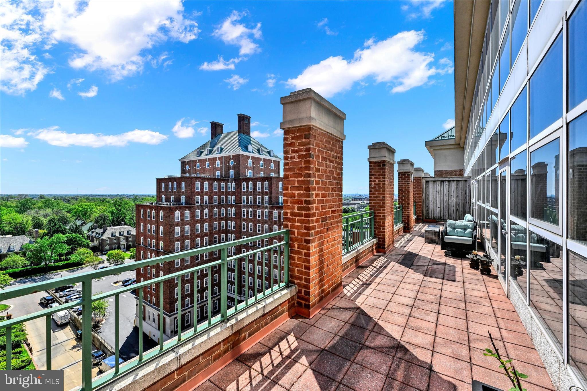 3801 Canterbury Road, Unit 1002 Baltimore, MD 21218 - Photo 1 of 32 a view of a balcony with chairs