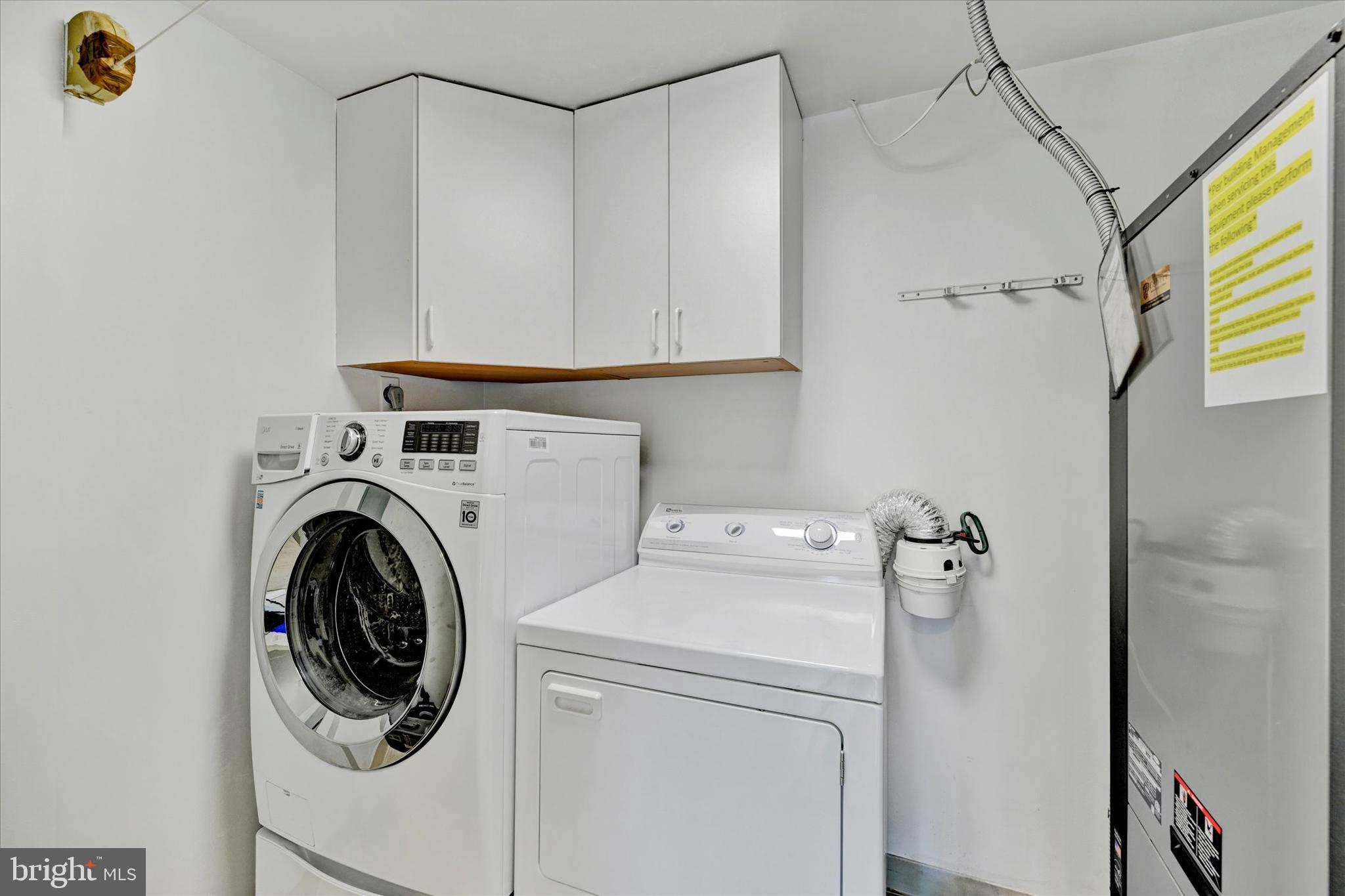 3801 Canterbury Road, Unit 1002 Baltimore, MD 21218 - Photo 13 of 32 a utility room with dryer and washer
