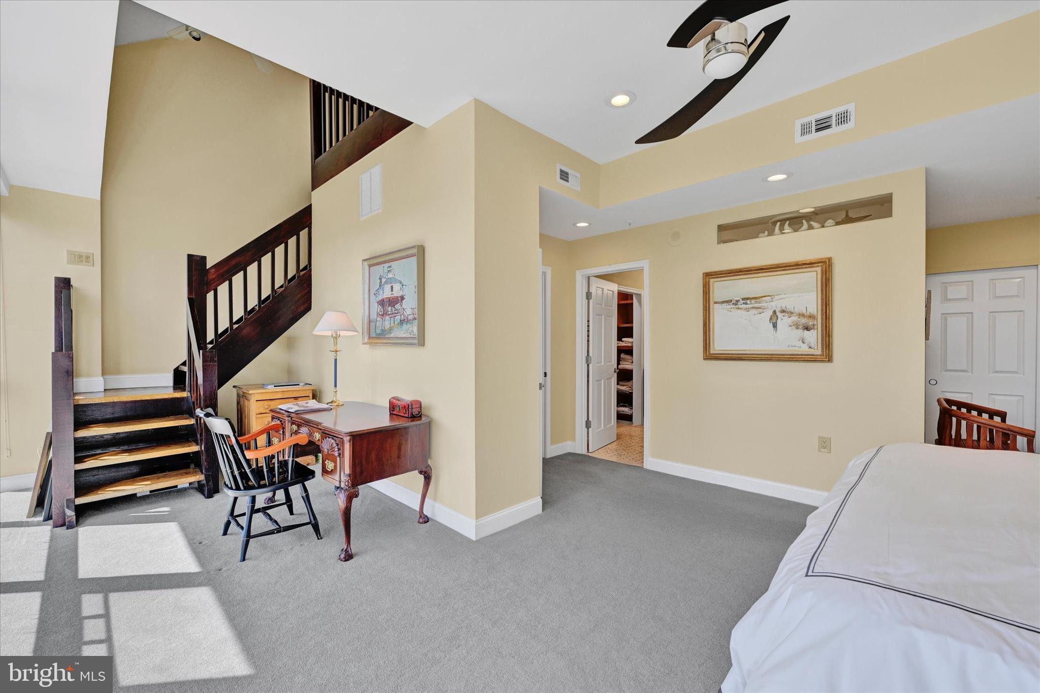 3801 Canterbury Road, Unit 1002 Baltimore, MD 21218 - Photo 20 of 32 a view of a livingroom with furniture and stairs