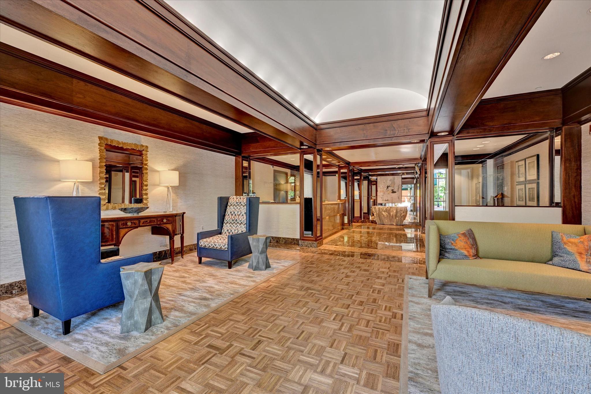 3801 Canterbury Road, Unit 1002 Baltimore, MD 21218 - Photo 3 of 32 a living room with furniture and a fireplace