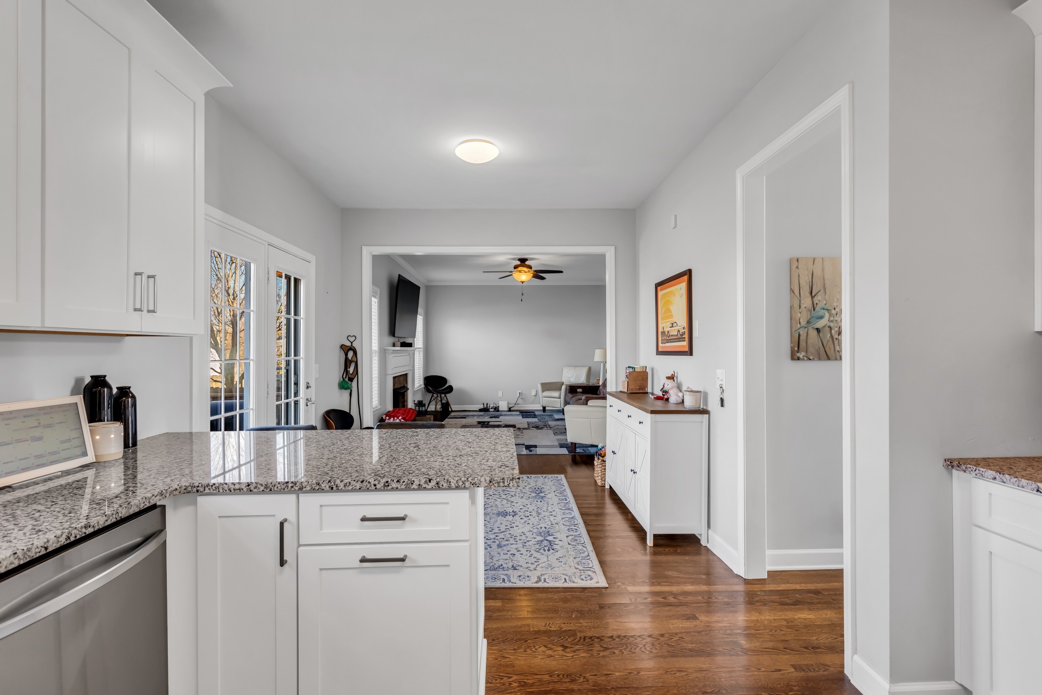 7009 Masonboro Drive Spring Hill, TN 37174 - Photo 15 of 40 a kitchen with stainless steel appliances granite countertop a sink stove and refrigerator