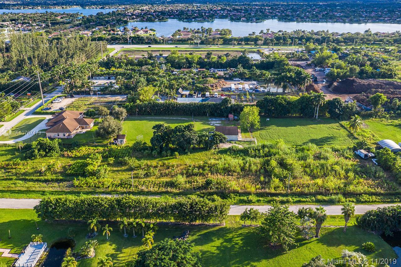6915 Southwest 185th Way Southwest Ranches, FL 33332 - Photo 46 of 48 an aerial view of residential houses with outdoor space and swimming pool