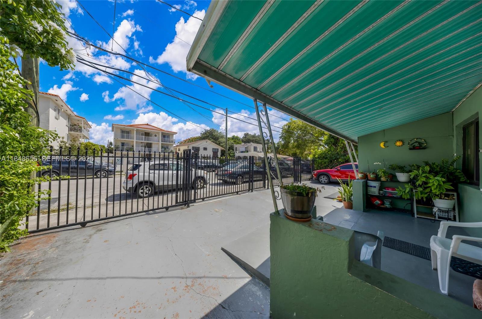 1858 Southwest 5th Street Miami, FL 33135 - Photo 4 of 23 a view of a chairs and tables in patio