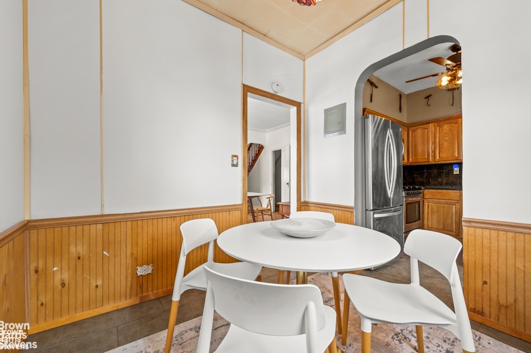 2954 Avenue R Brooklyn, NY 11229 - Photo 12 of 37 a view of a dining room with furniture and wooden floor