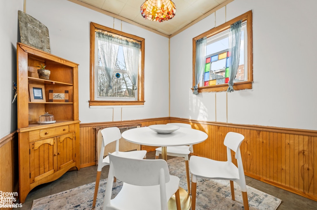 2954 Avenue R Brooklyn, NY 11229 - Photo 13 of 37 a dining room with furniture and window