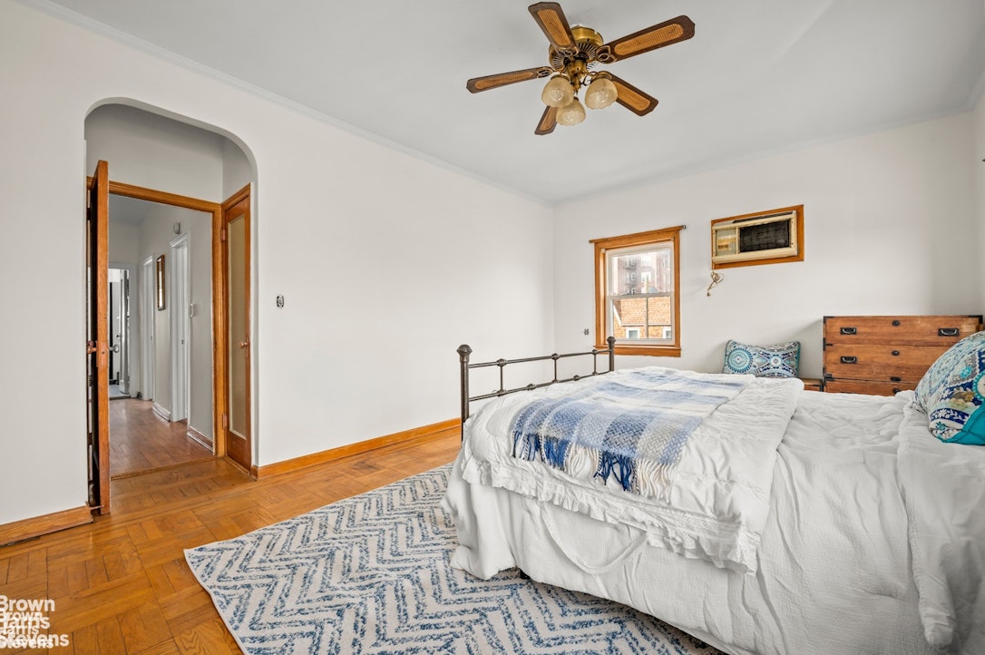 2954 Avenue R Brooklyn, NY 11229 - Photo 19 of 37 a bedroom with a bed and dresser