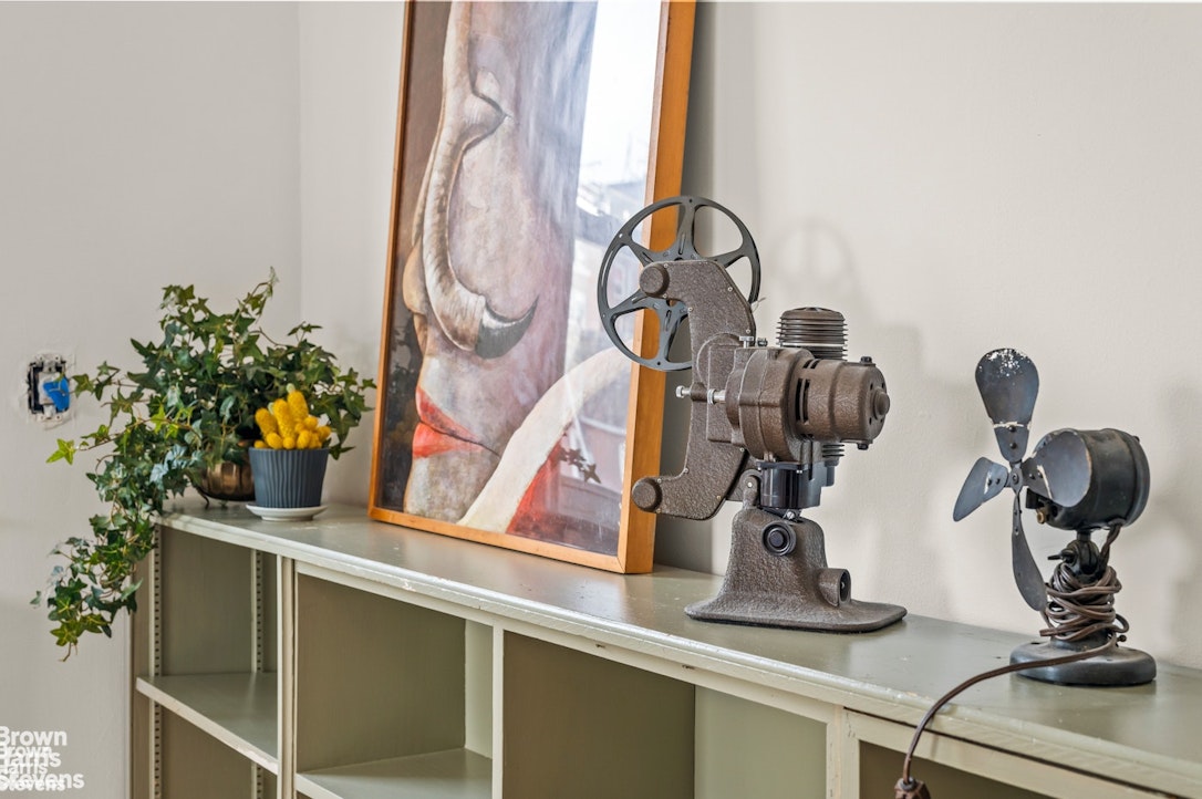 2954 Avenue R Brooklyn, NY 11229 - Photo 23 of 37 a kitchen with a sink and a mirror