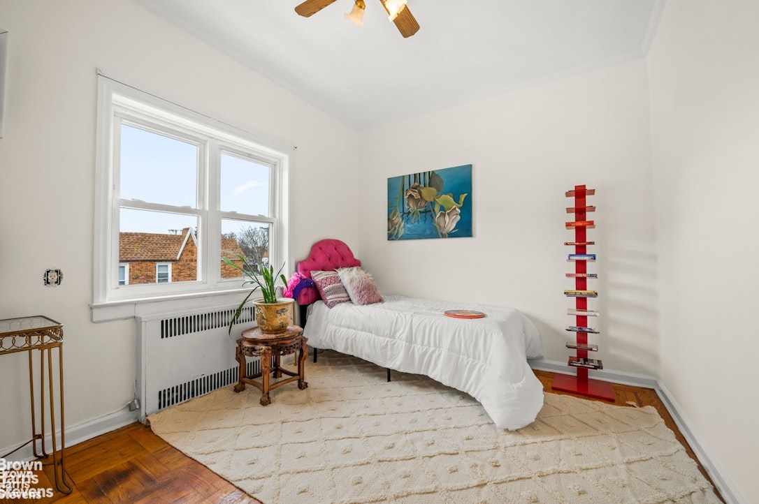 2954 Avenue R Brooklyn, NY 11229 - Photo 25 of 37 a bedroom with furniture and a window