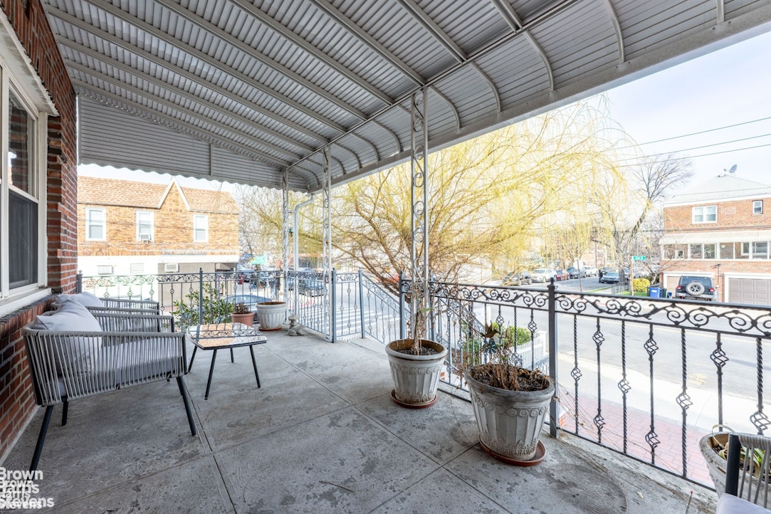 2954 Avenue R Brooklyn, NY 11229 - Photo 4 of 37 a view of a chair and tables back yard of the house