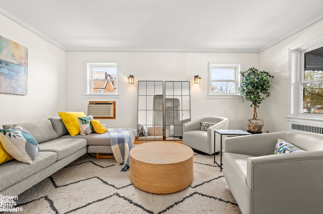 2954 Avenue R Brooklyn, NY 11229 - Photo 7 of 37 a living room with furniture and a window