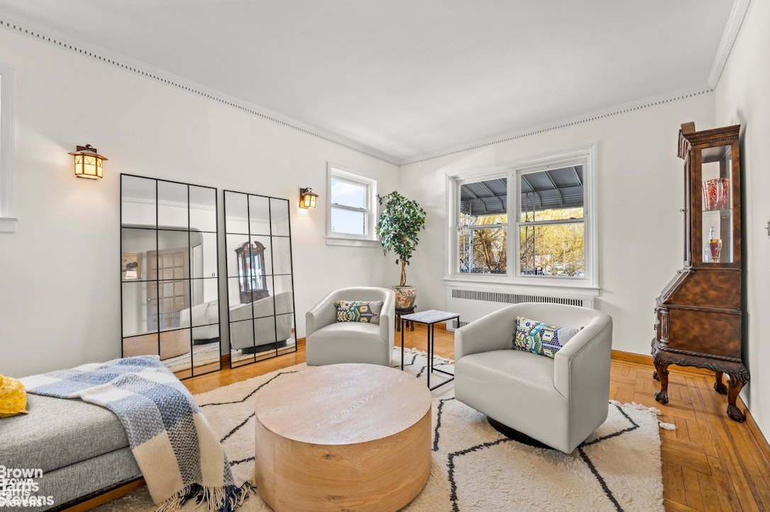 2954 Avenue R Brooklyn, NY 11229 - Photo 8 of 37 a living room with furniture and a window