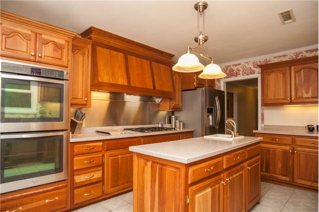 150 Cherokee Road Hendersonville, TN 37075 - Photo 5 of 20 A CHEF'S DREAM OF A KITCHEN W/ DOUBLE OVENS, GAS COOKTOP, AND ISLAND.