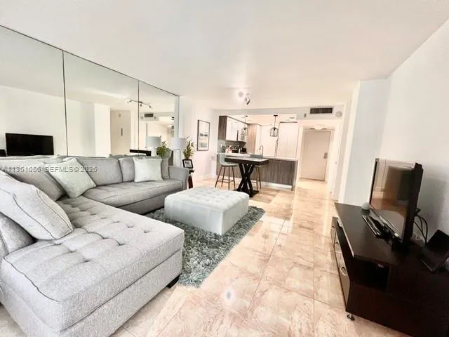 a living room with furniture and a couch