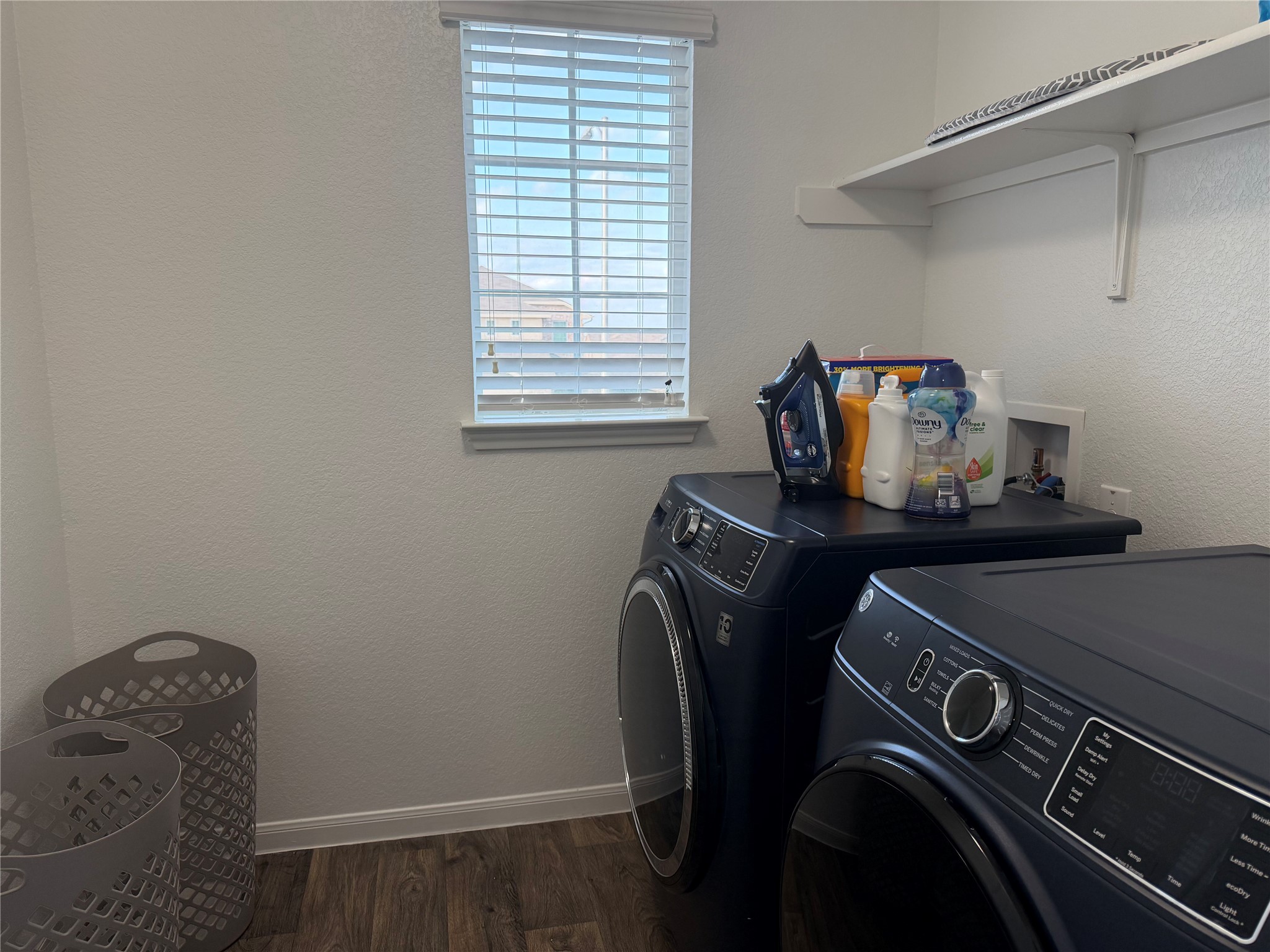 12111 Riprap Drive Manor, TX 78653 - Photo 11 of 14 a utility room with dryer and washer
