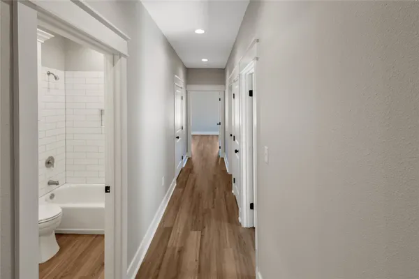 a view of a bathroom from the hallway