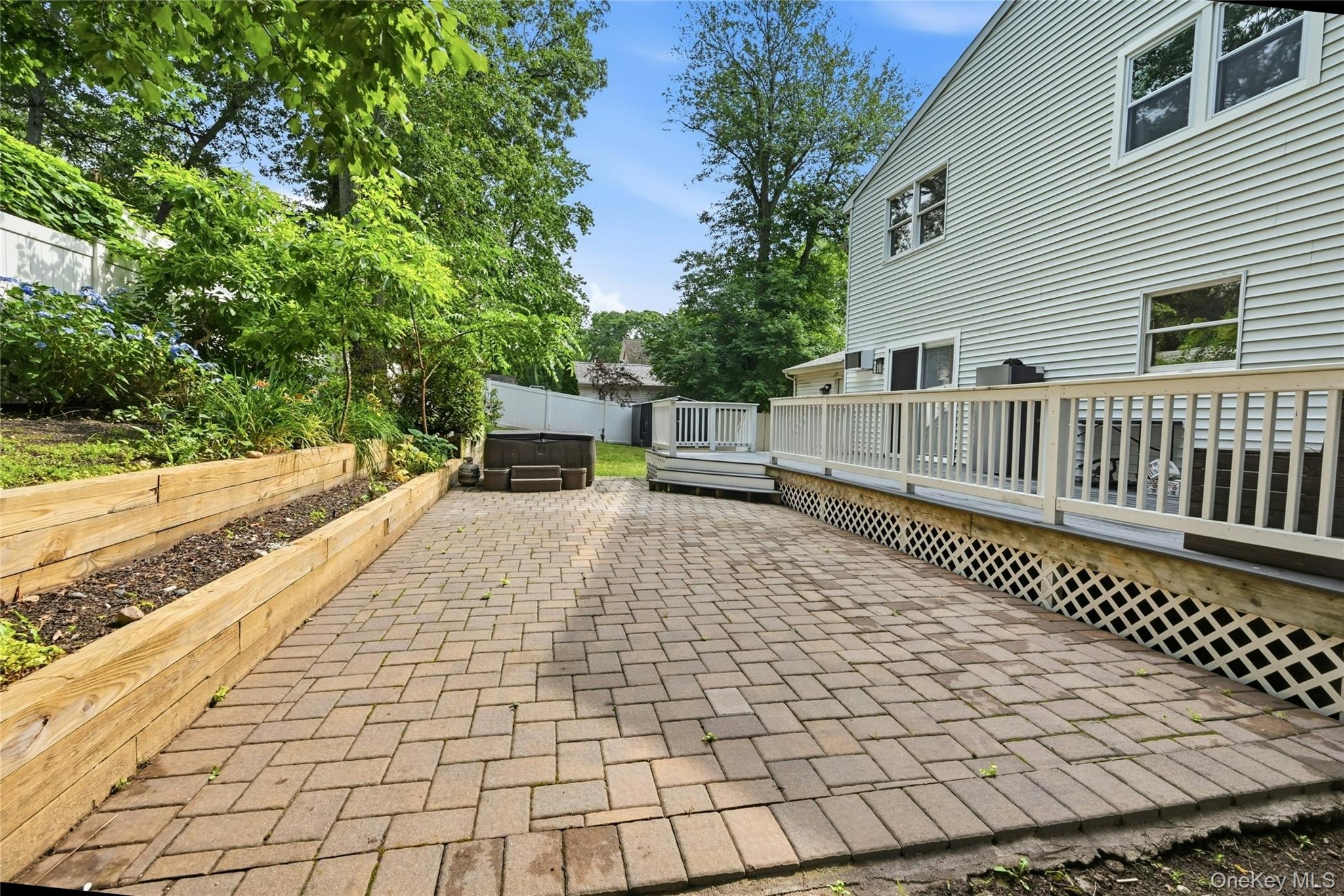 15 Birch Road Rocky Point, NY 11778 - Photo 27 of 30 Raised planting beds next to the patio