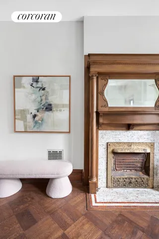 a living room with furniture and large windows